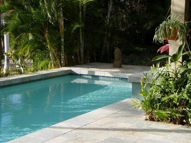 Maui pool deck quartzite tile BY DESIGN Builders Brian Rigney